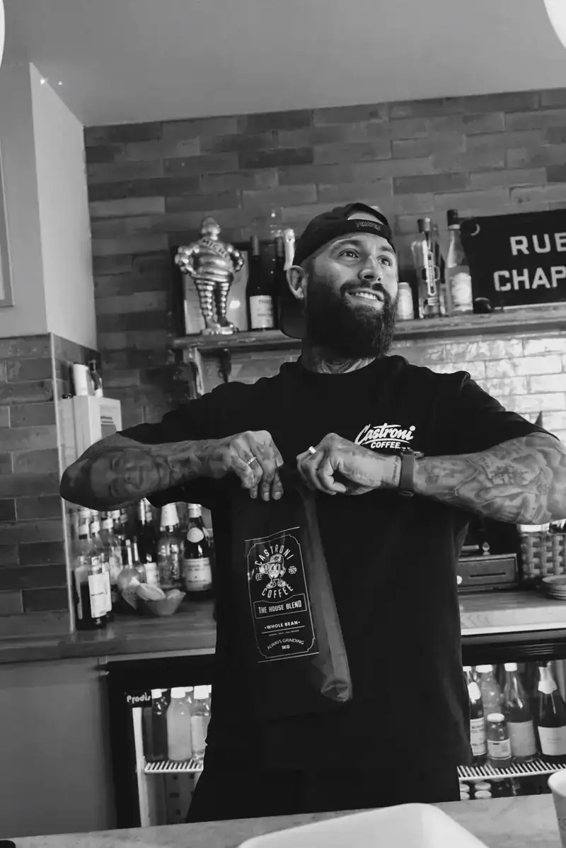 Emiliano Castroni behind the bar in Huddersfield