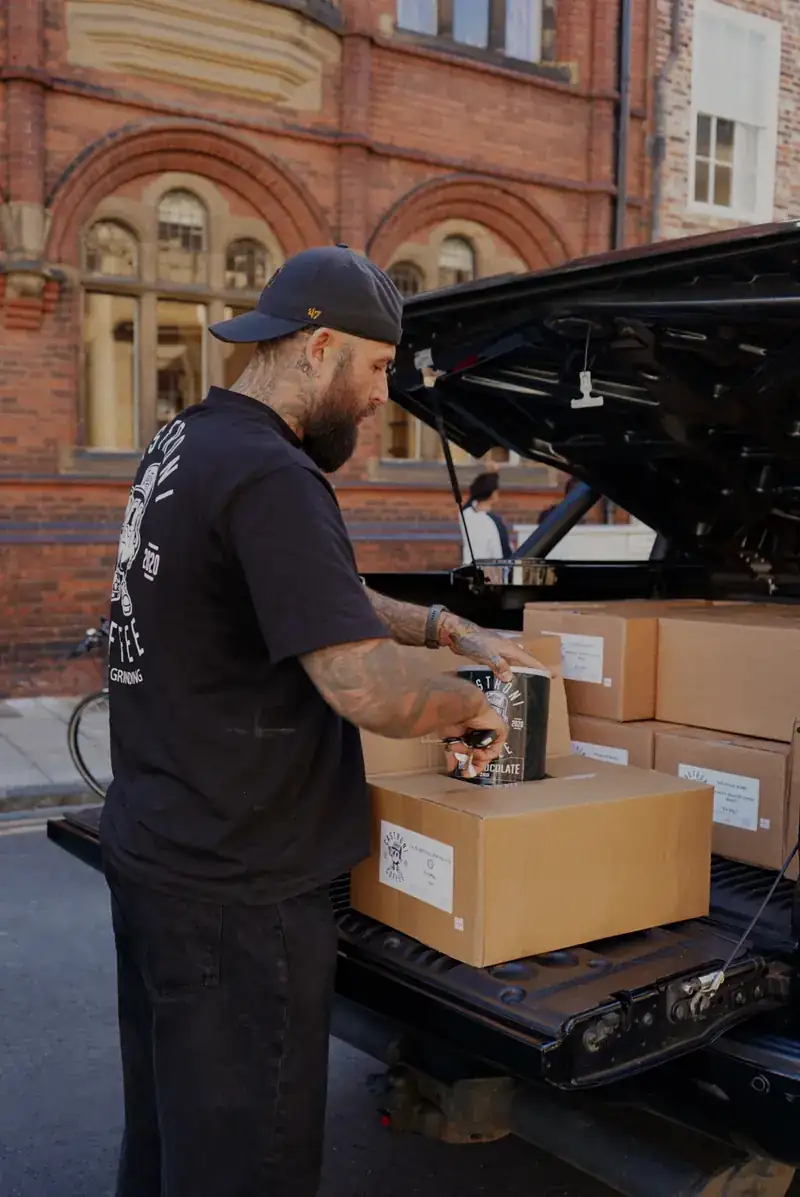 Loading boxes of coffee into the Castroni pickup